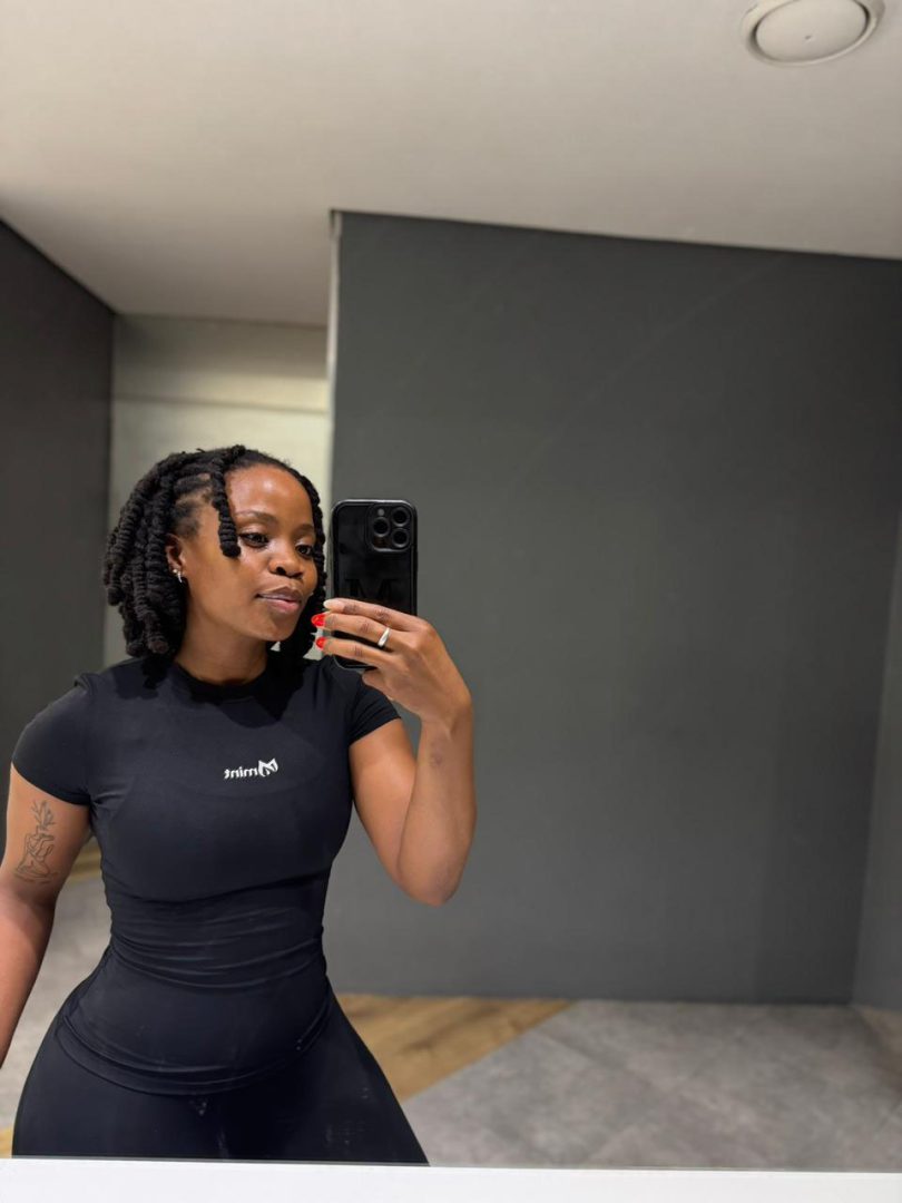 Close up of Mint Essence short sleeve gym top with embroidered Mint Athleisure logo.
